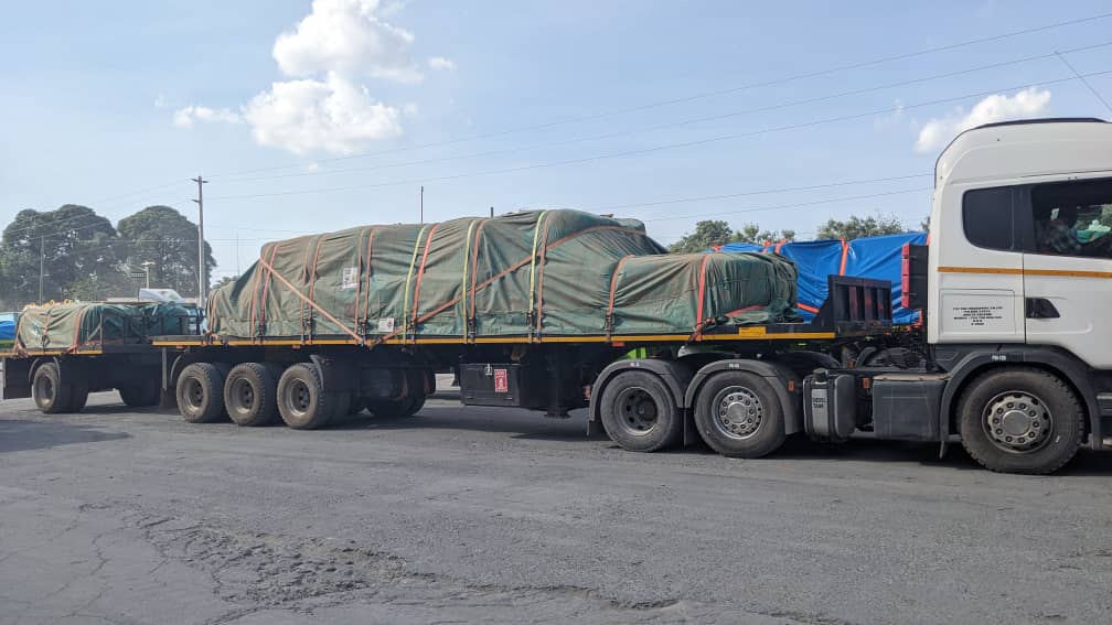 TTC Scania truck beside a loaded trailer